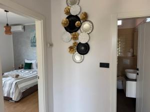 a room with plates and pans hanging on the wall at Dalmatia Nin Apartment with Private Jacuzzi in Nin