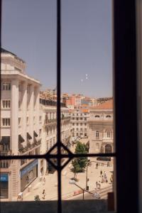 a view of a city from a window at Lisbon Destination in Lisbon