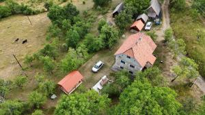 an aerial view of a house with a car parked next to it at Etno kuća Krvavac in Pljevlja