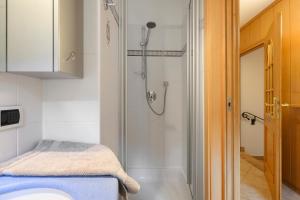 a bathroom with a shower and a sink at Altebnerhof Leifers in Laives +91 photos
