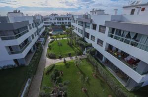an aerial view of a building with a courtyard at Comfort and luxury with pool in Tamaris