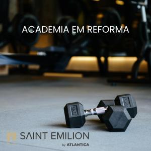 two dumbbells on the floor with the wordsatta emremiru emrem at Saint Emilion by Atlantica in Curitiba +63 photos