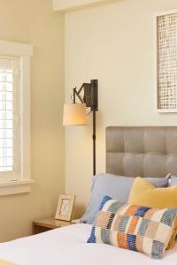 a bedroom with a bed and a lamp at Playa One Bedroom (253) in Carpinteria