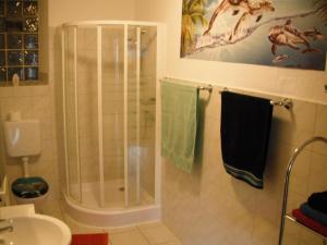 a bathroom with a shower and a sink at Gasthaus Zehrermühle in Schönberg +91 photos
