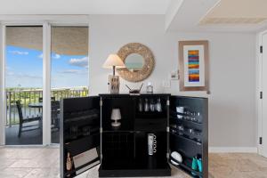 a wine tasting room with a view of the ocean at Lovers Key #508 by Sun Palace Vacations in Fort Myers Beach +32 photos