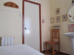 Postel nebo postele na pokoji v ubytování Pension Alamar