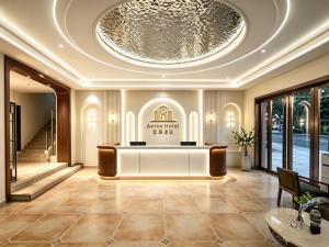a lobby of a hotel with a round ceiling at AERON hotel in Yakkasaray