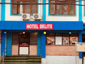 a hotel building with a hotel delite sign on it at Hotel Delite in Thapathali