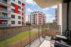 an apartment balcony with a view of a courtyard at A&R Residence Nest in Arad