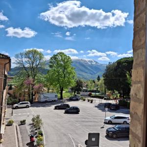 a view of a parking lot with mountains in the background at Casa Stella in Sarnano