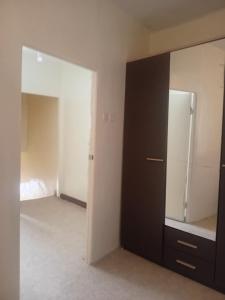 an empty room with a mirror and a closet at Dar Al Medina in Casablanca