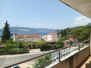 a view from the balcony of a house at Kumbor S in Herceg-Novi