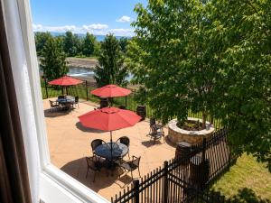 an overhead view of a patio with tables and umbrellas at Comfort Inn & Suites Walla Walla in Walla Walla