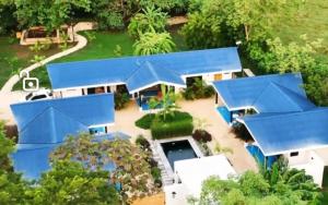 an aerial view of a house with a blue roof at Villa Peuchere in Santa Cruz