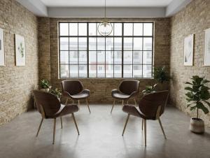 a waiting room with chairs and a large window at Hotel Rise Grand Kukatpally Near Hitex Exhibition Center & Nexus Mall, Yashoda Hospital in Hyderabad +22 photos
