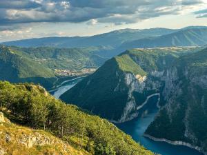 a view of a river in the mountains at Apartment LAKEVIEW in Plužine