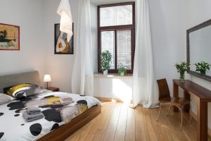 Posteľ alebo postele v izbe v ubytovaní Style4rent Apartament Kazimierz