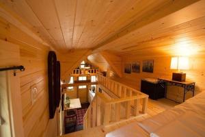 an overhead view of a room with a staircase in a cabin at Casa Rosa Unit C on Lake Conroe in Willis