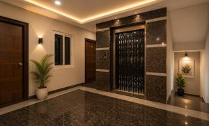 a walk in wine cellar in a house at Hotel Rise Grand Kukatpally Near Hitex Exhibition Center & Nexus Mall, Yashoda Hospital in Hyderabad