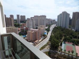 a view of a city from the balcony of a building at Bali Apartamento in Benidorm