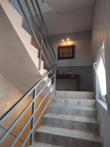 a set of stairs in a house with a window at The VIEW in Belgrade