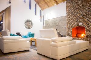 Posezení v ubytování Runda Lofts