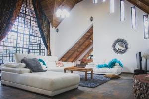 Posezení v ubytování Runda Lofts
