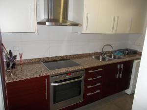 Kuhinja oz. manjša kuhinja v nastanitvi Apartamento impecable en playa de Almenara