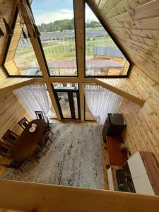 an overhead view of a room with a large window at Barnhouse in Bosteri