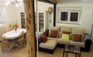 a living room with a couch and a table at Casa Rural Lutia in Andaluz