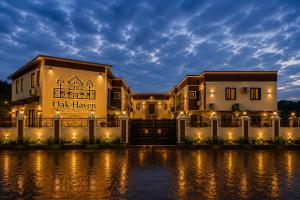 a night view of a apartment building with lights at Oak Haven Lodging & Suites in Sagamu