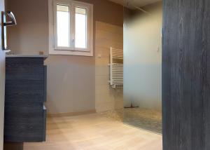 a bathroom with a sink and a window in a room at Gîte Chez Clara in Rocamadour +22 photos