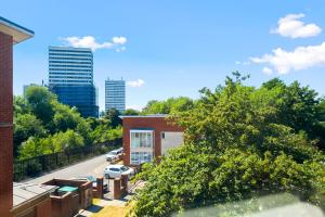 a view of a building with trees and a street at Providence Suites 1 Bedroom Sleeps 4 Perfect for Contractors and Families and Solo Travellers in Fallings Park