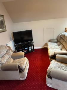 Ruang duduk di Strathmoy Bed & Breakfast