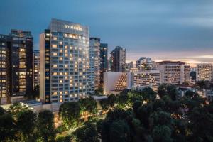 a view of a city skyline with tall buildings at The St. Regis Singapore in Singapore +99 photos