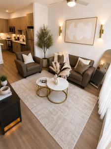 a living room with a couch and a table at River Walk in San Antonio
