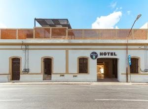 a hotel on the side of a street at Hotel Pakal 58 Centro in Mérida