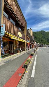 an empty street in front of a building at Cafe&Stay Stella in Minakami