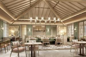 a rendering of a restaurant with tables and chairs at The St. Regis Goa Resort in Cavelossim