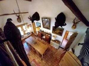 an aerial view of a living room with antlers on the wall at Les Gordons in Chaumont-sur-Tharonne +6 photos