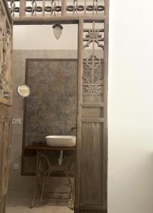 a bathroom with a sink and a mirror at Lesní Mlýn Depandance in Mariánské Lázně +68 photos