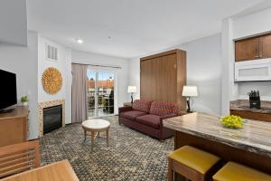 a living room with a couch and a table at WorldMark Solvang in Solvang