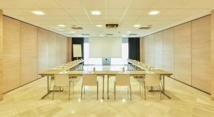 a large conference room with a long table and chairs at Sercotel Amistad Murcia in Murcia +58 photos