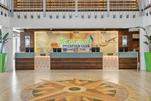 a lobby of a restaurant with a star on the floor at Margaritaville Vacation Club - St Thomas in Frydendal +34 photos
