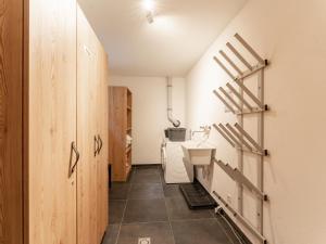 a bathroom with a toilet and a sink at Chalet Sylvia in Krimml +25 photos
