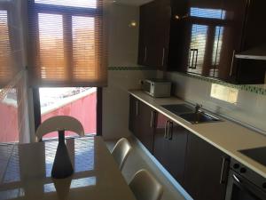 A kitchen or kitchenette at Dream Cuesta
