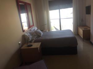 A bed or beds in a room at Dream Cuesta