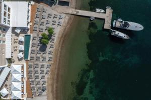 an overhead view of a dock with a boat in the water at Patmos Aktis, a Luxury Collection Resort & Spa, Greece in Patmos