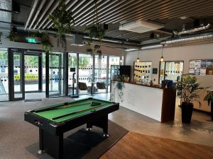 a billiard room with a pool table in it at Curraheen Point Cork - Easy Access to City Centre in Cork