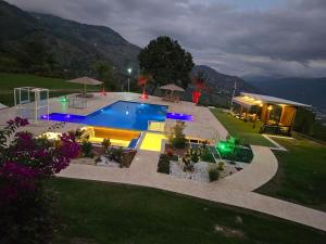 an overhead view of a swimming pool at night at Finca Villa Rosita 26 in Copacabana